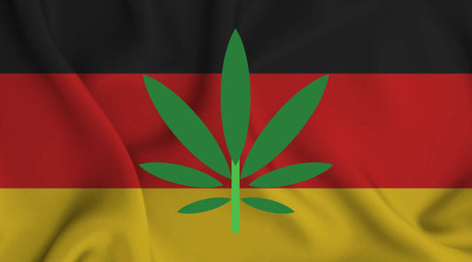 Drapeau allemand et feuille de cannabis illustrant la légalisation en Allemagne
